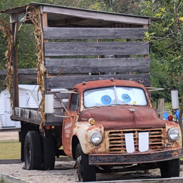 a recreation of Tow Mater from the Cars movies using a real truck